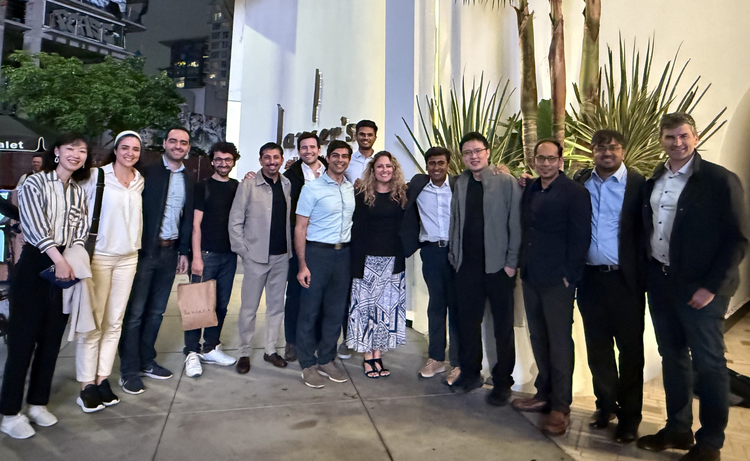 Past and present group members at ICOSSAR conference (2025)
